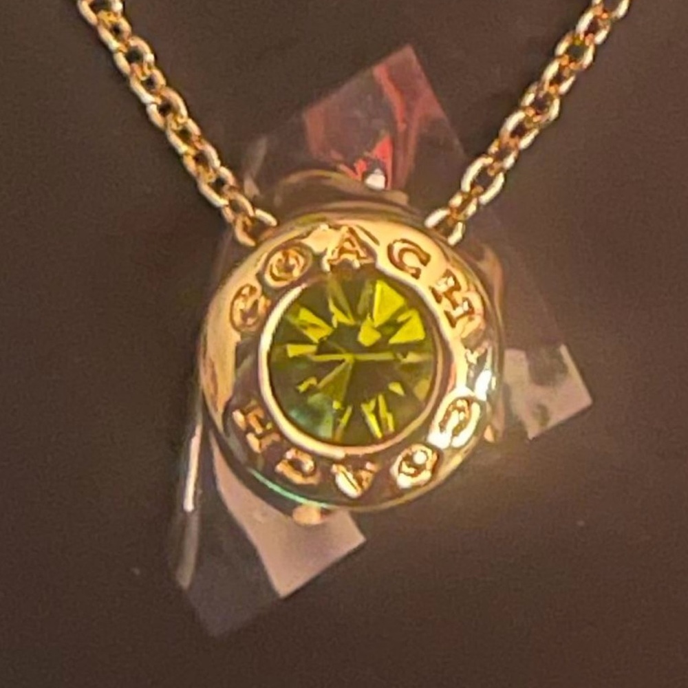 Coach Gold Necklace with Green Pendant